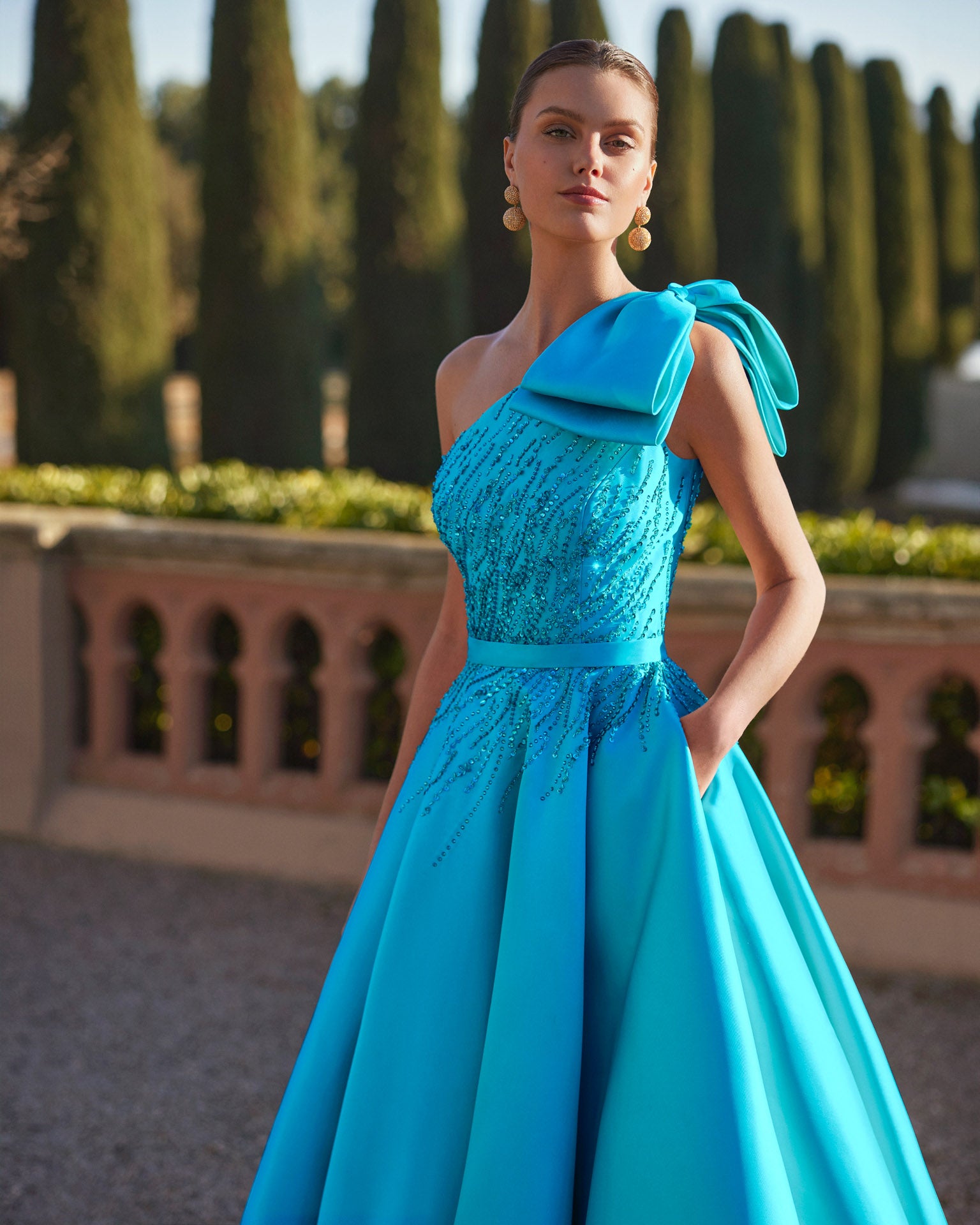 ASSYMETRIC BOW A LINE GOWN