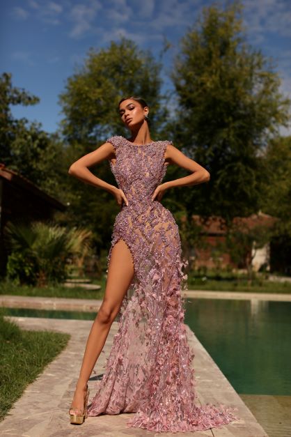 BEADED PINK GOWN WITH DELICATE FEATHER SKIRT