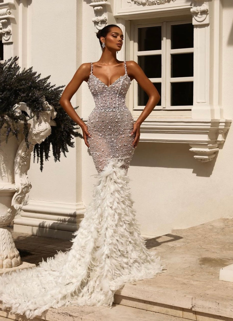 BEADED GOWN WITH FEATHERED SKIRT