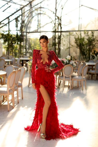 BEADED RED CORSET DRESS WITH LONG FEATHER SKIRT