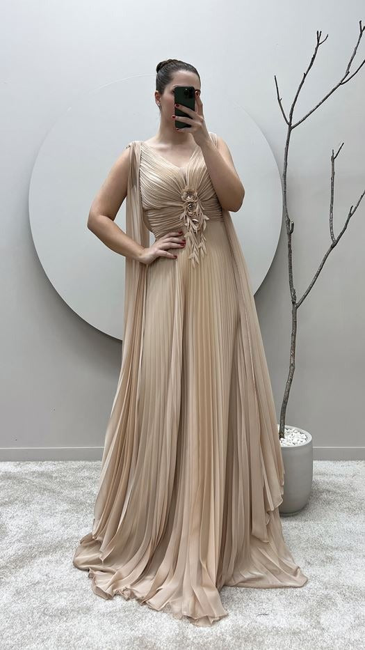 PLEATED GOWN WITH DRAPED FEATURE