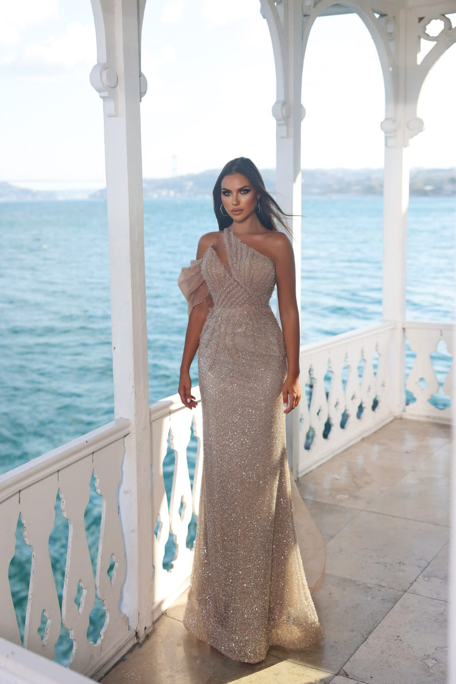 MODESSA BEADED GOWN WITH ONE SLEEVE DRAPED BODICE FEATURE