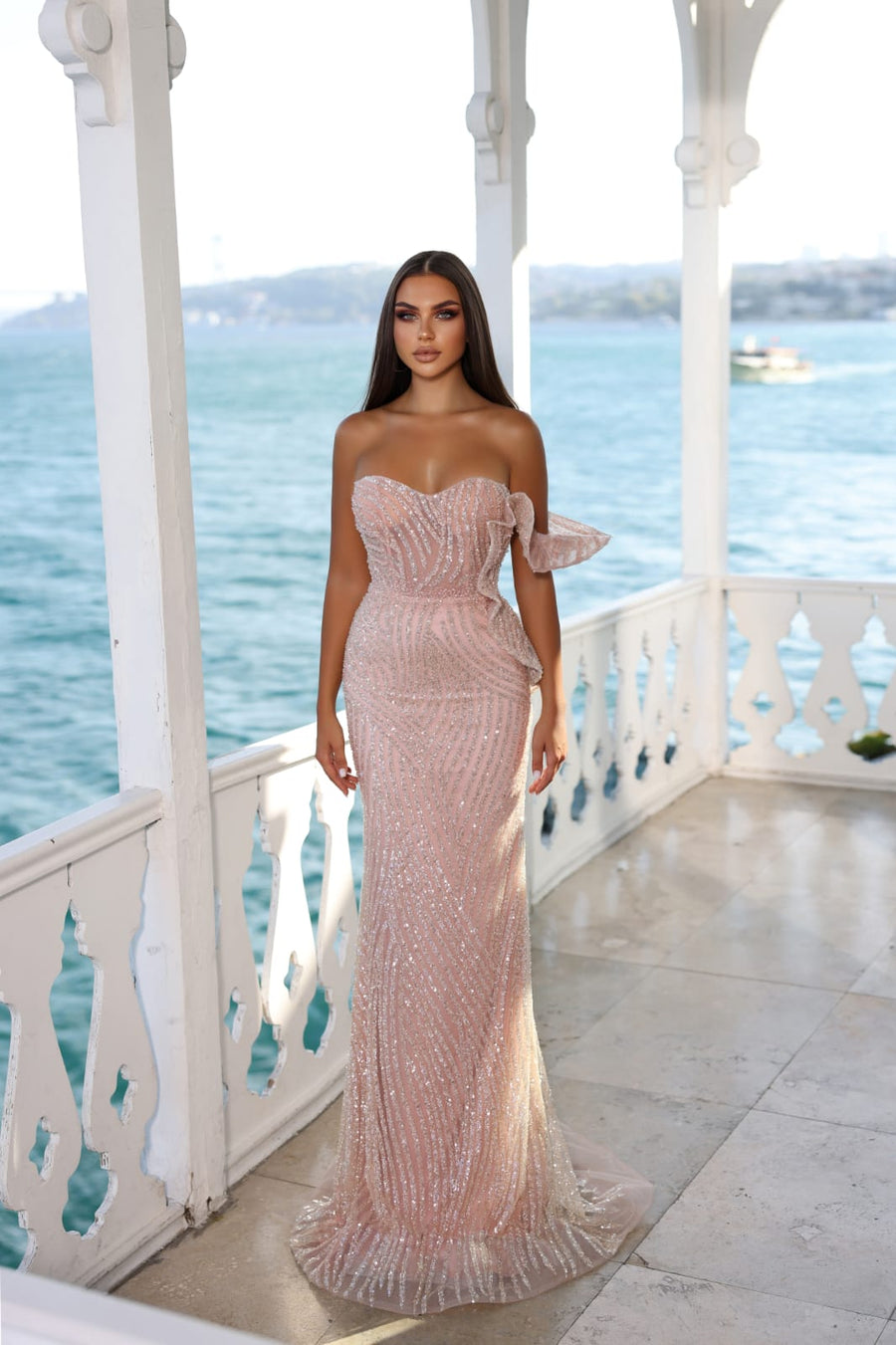 MODESSA BEADED GOWN WITH SHOULDER PEPLUM DETAIL